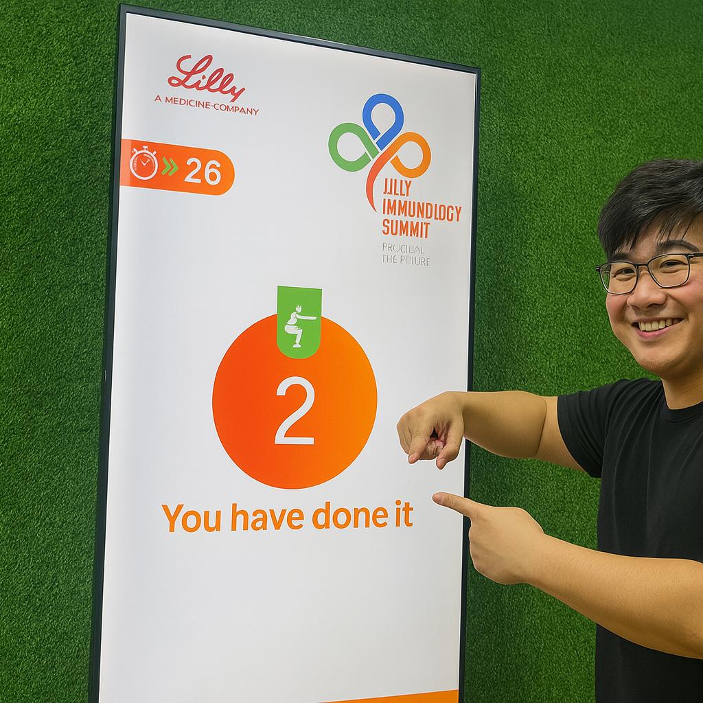 Participants enjoying the Squat Game Challenge at a corporate event in Dubai, engaging in fitness and team-building through real-time interactive squat tracking.